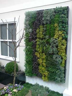Vertical Herb Garden Design on a house wall